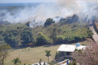 here's the view from the roof of the house in the previous shot, overlooking our friends Rick (above) and Peter's house -- the fire went right up to their property line