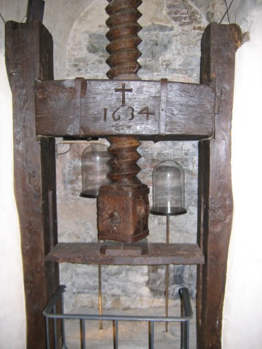 The friendly proprietors served us prosecco with gold dust sprinkled into it and showed us their ancient olive oil press (above), cheese cellar, and wine-stomping vat.