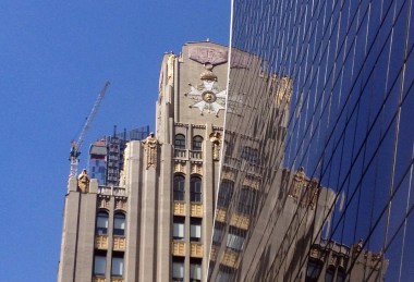 I'd never noticed the gilt detail at the top of this building on W. 57th Street before.