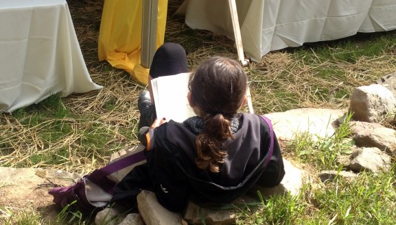 this 10-year-old just plunked herself down and read her book (SPEAK by Laura Halse Anderson, if you must know)