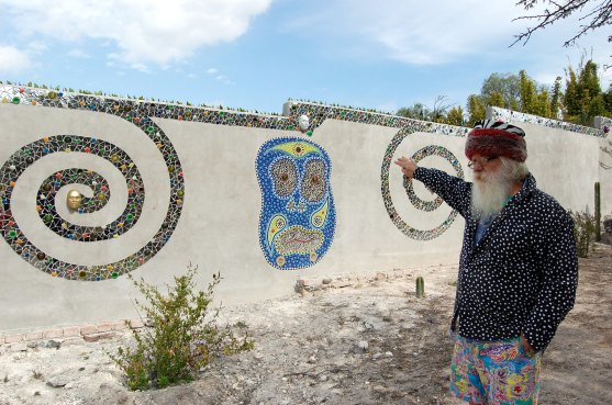 work-in-progress: along the garden wall, Anado is creating a long mosaic mural based on the Tarot deck
