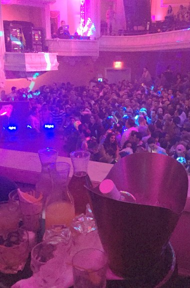 They'd bought premium tickets that entitled us to our own private box complete with bottle service.