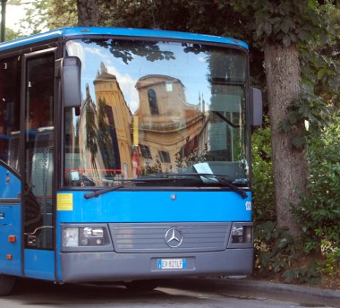 6-15 siena reflected in bus window